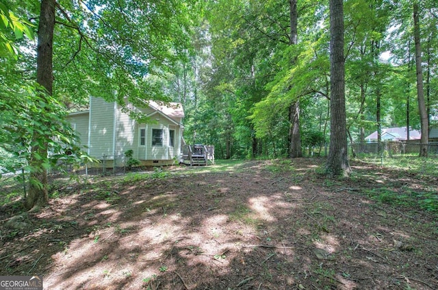 view of yard featuring a deck