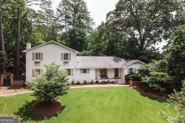 view of front of home with a front yard