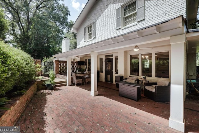 view of patio / terrace with an outdoor living space and ceiling fan