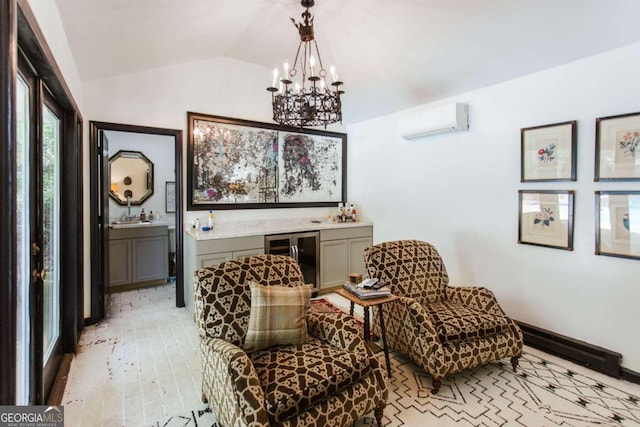 living area with vaulted ceiling, a wall mounted air conditioner, beverage cooler, light hardwood / wood-style floors, and an inviting chandelier