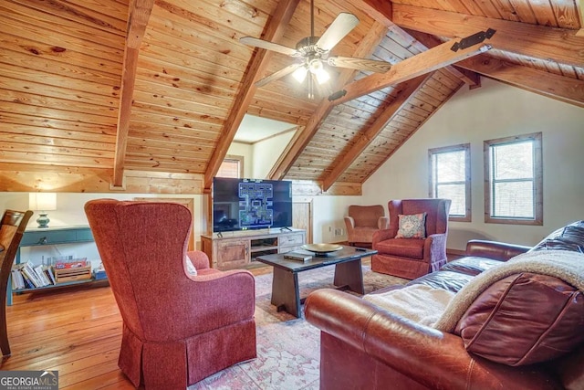 living room with wooden ceiling, vaulted ceiling with beams, and light hardwood / wood-style flooring