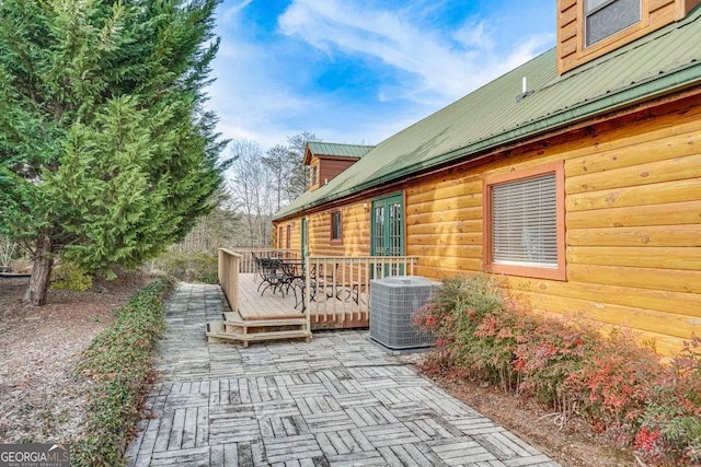 view of patio / terrace featuring a deck and cooling unit