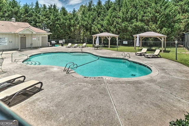 view of pool featuring a gazebo and a patio