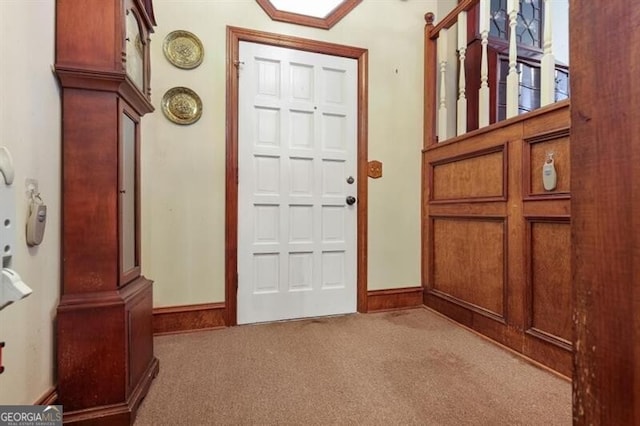 view of carpeted foyer