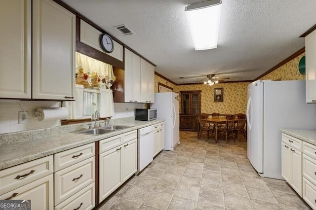 kitchen featuring ornamental molding, white appliances, light tile patterned floors, and ceiling fan