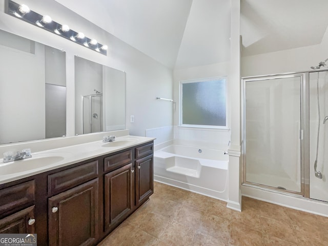 bathroom with lofted ceiling, plus walk in shower, and vanity