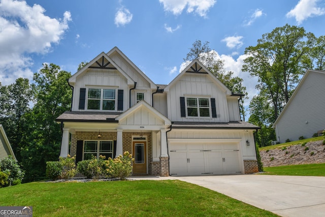 craftsman-style house with a garage and a front lawn