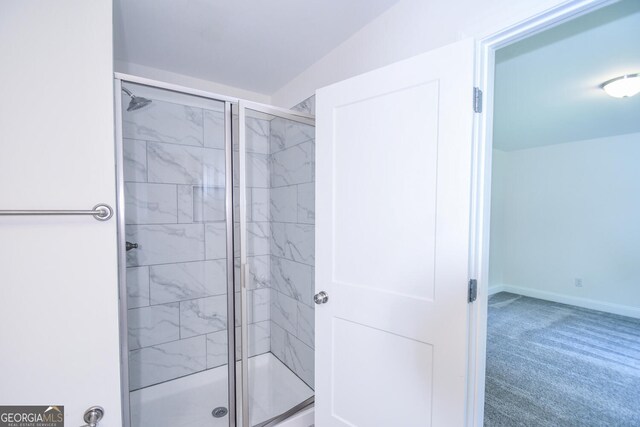 bathroom with an enclosed shower