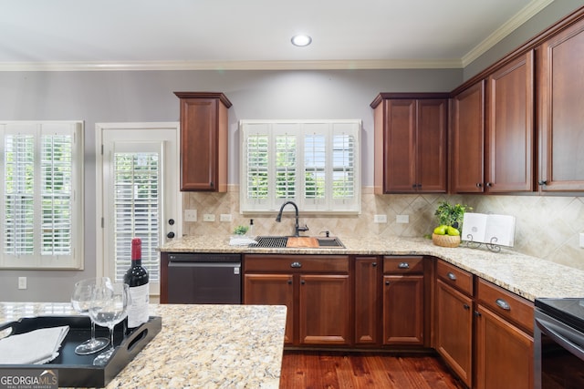 kitchen featuring black dishwasher, dark wood-type flooring, ornamental molding, tasteful backsplash, and sink