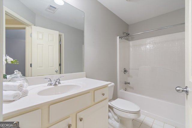 full bathroom featuring tile patterned floors, vanity, shower / bath combination, and toilet