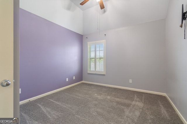 spare room with ceiling fan, carpet, and lofted ceiling