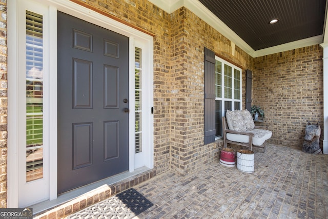 doorway to property with covered porch