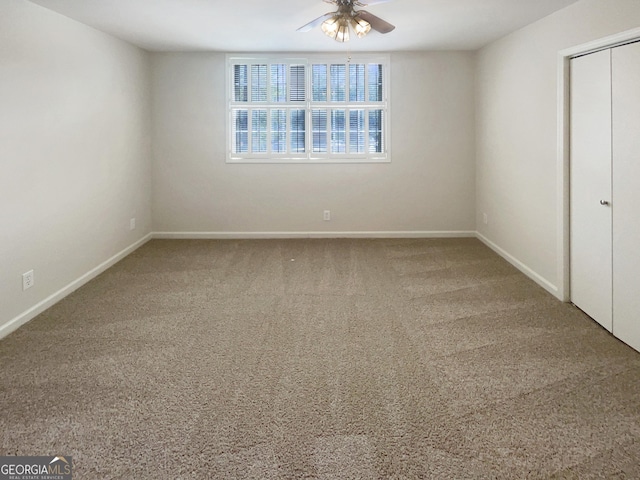 interior space featuring ceiling fan