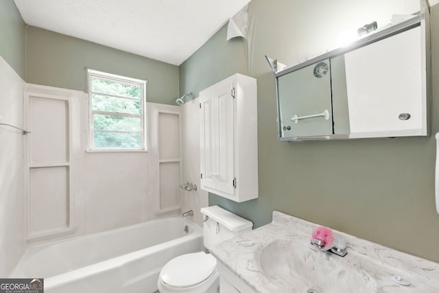 full bathroom featuring vanity, bathtub / shower combination, and toilet