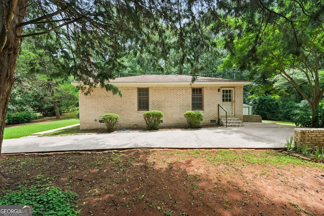 back of property featuring a patio area