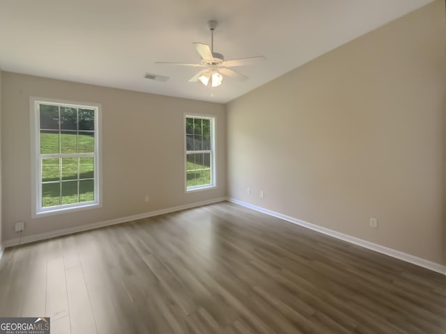 empty room with wood-type flooring and ceiling fan