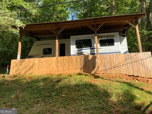 exterior space featuring a front lawn