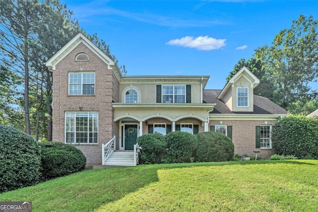 view of front facade with a front yard