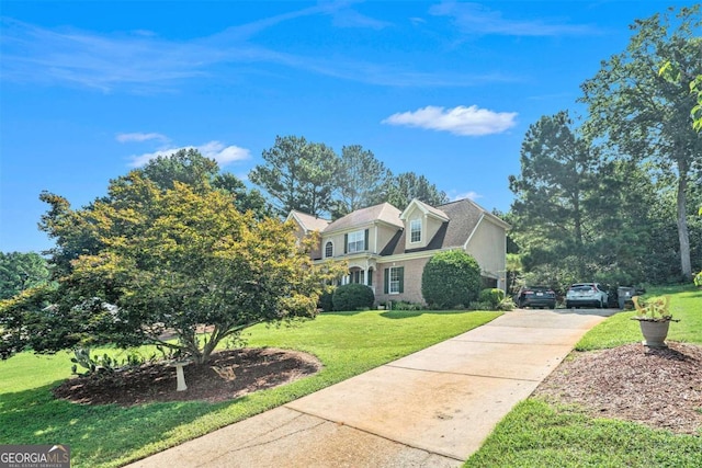 view of front of home with a front lawn