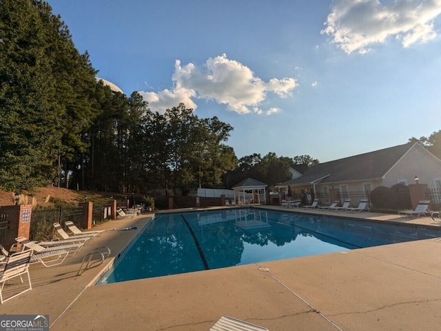 view of pool featuring a patio