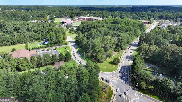 drone / aerial view with a forest view