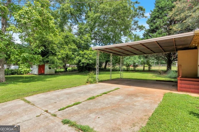 exterior space with a carport and a yard