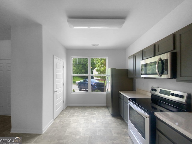 kitchen with appliances with stainless steel finishes