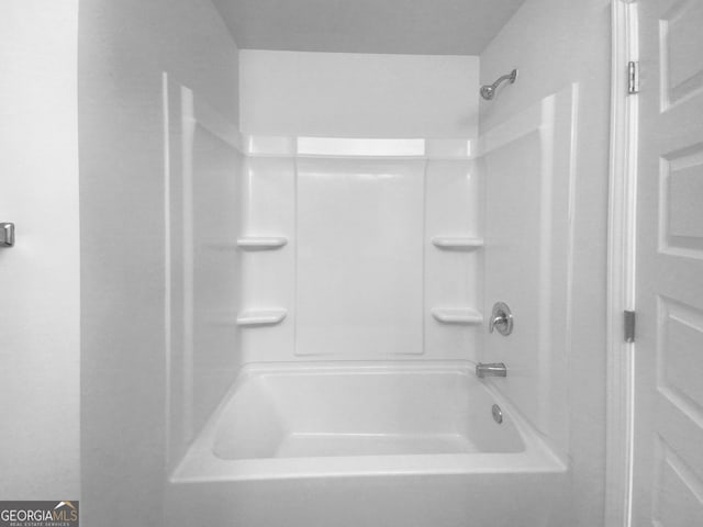 bathroom featuring washtub / shower combination