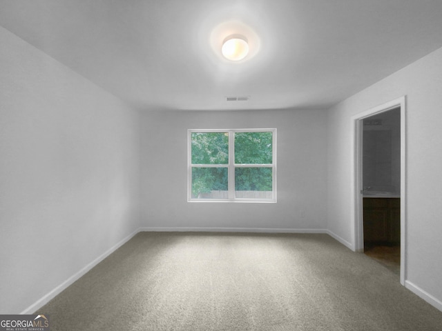 view of carpeted spare room