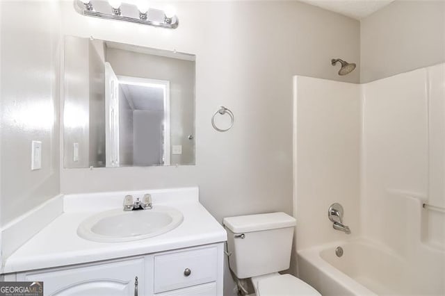 full bathroom featuring vanity, shower / bathing tub combination, and toilet