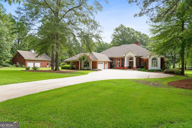 single story home with a garage and a front yard