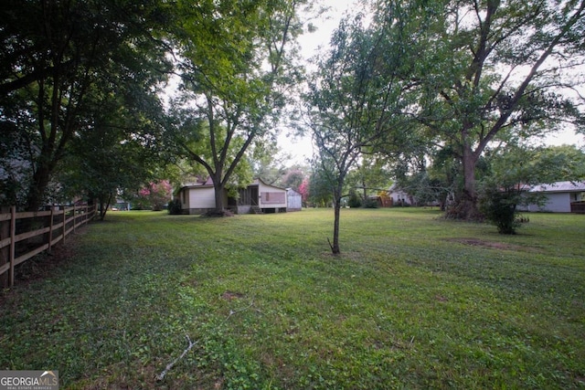 view of yard with a garage