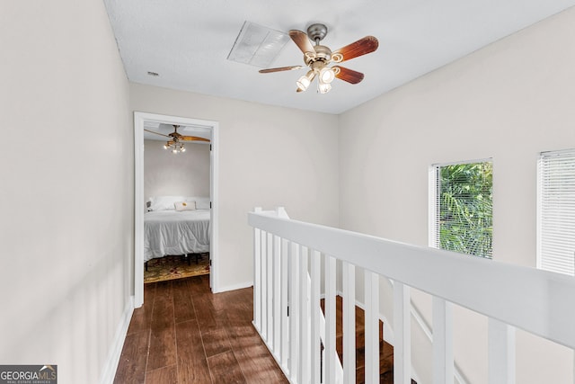 hallway featuring dark hardwood / wood-style floors