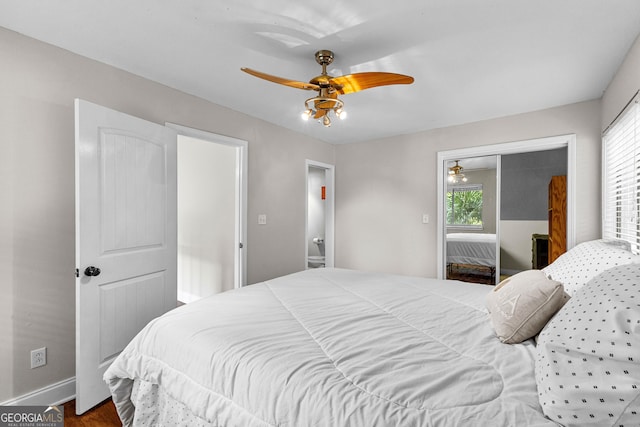 bedroom with hardwood / wood-style floors and ceiling fan