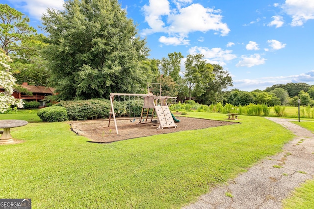 view of play area with a yard