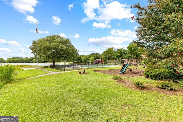 view of yard with a playground