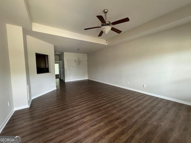 unfurnished living room featuring dark hardwood / wood-style floors and ceiling fan with notable chandelier