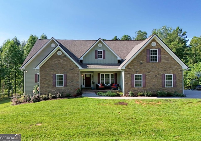 craftsman-style home with a front lawn