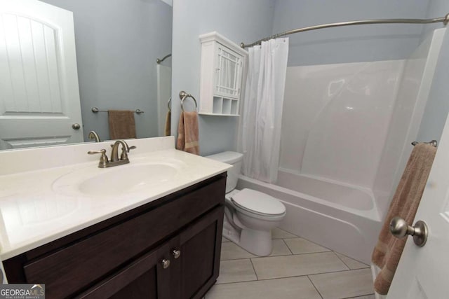 full bathroom featuring vanity, shower / bath combo, toilet, and tile patterned flooring