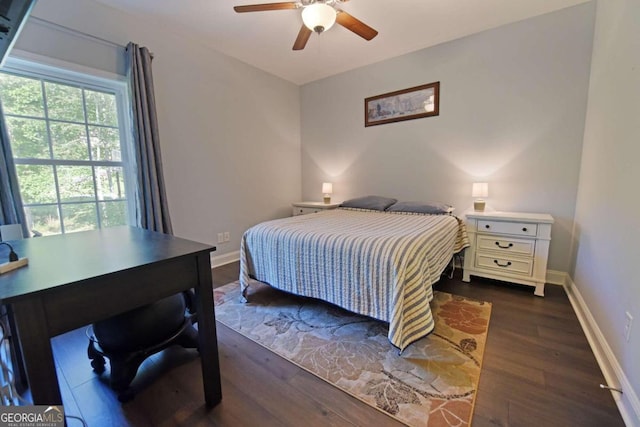 bedroom featuring dark wood-type flooring and ceiling fan