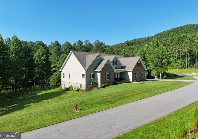 exterior space with a front yard