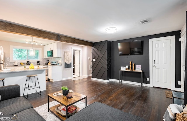 living room with dark wood-type flooring