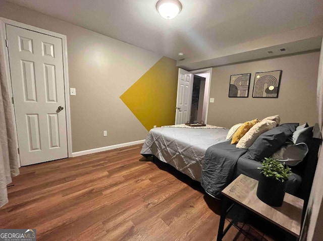 bedroom featuring hardwood / wood-style flooring