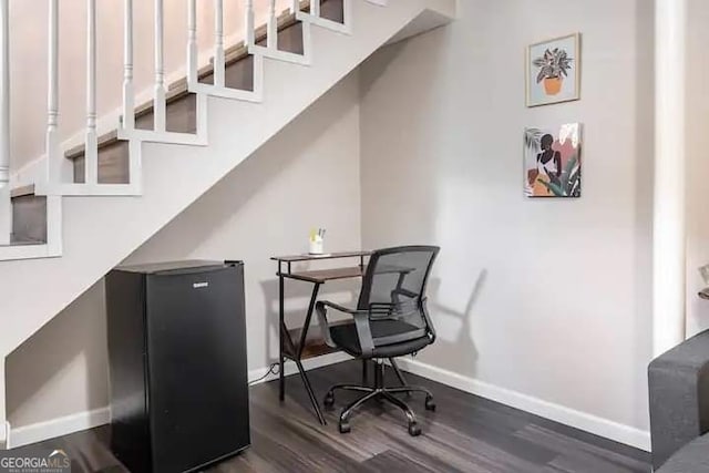 office space featuring dark wood-type flooring