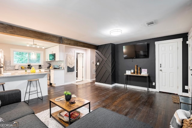 living room with dark wood-type flooring