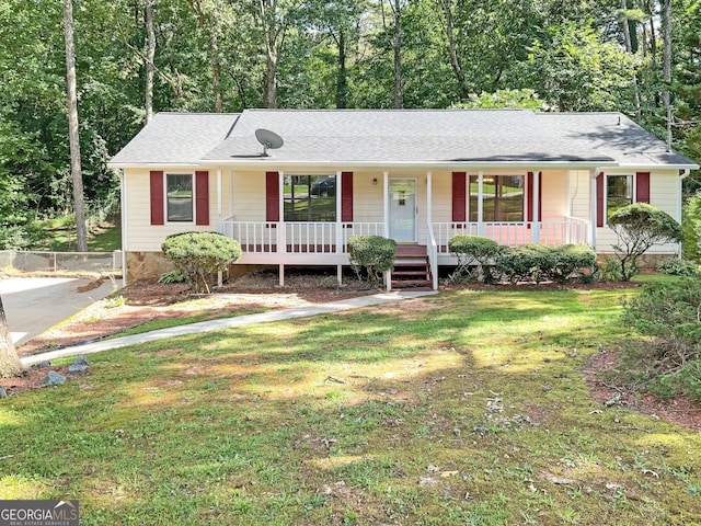 single story home with a front lawn and a porch