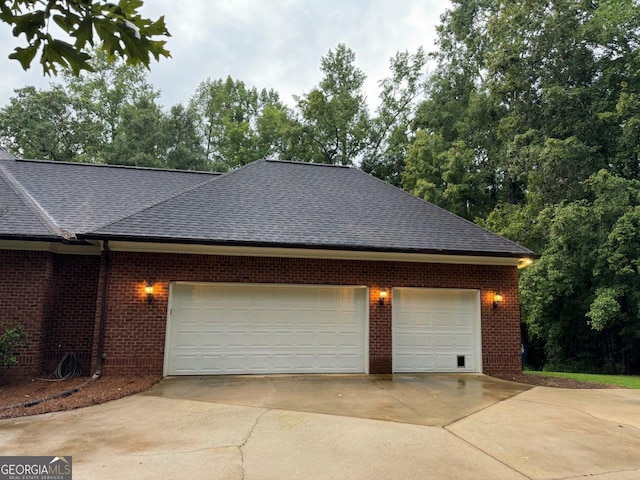 exterior space with a garage