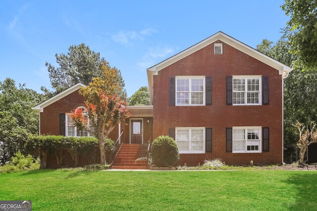 view of front facade with a front yard