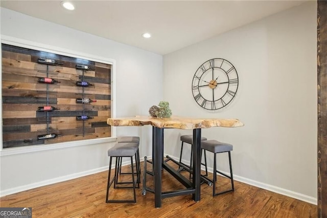 dining area featuring wood-type flooring