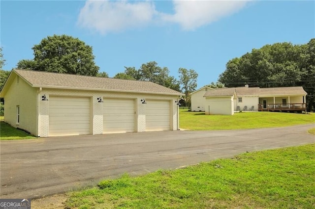 garage with a lawn